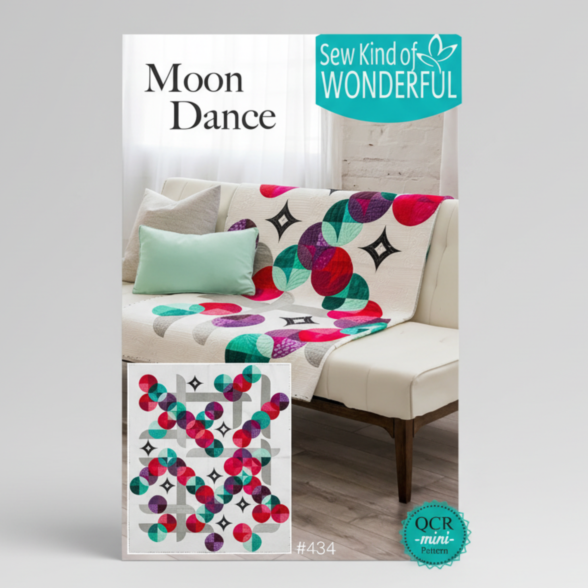 Sewing pattern cover for 'Moon Dance' quilt with colorful design on a couch.