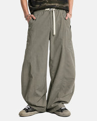 Full outfit styling with Cordura wide leg pants and casual plaid shirt