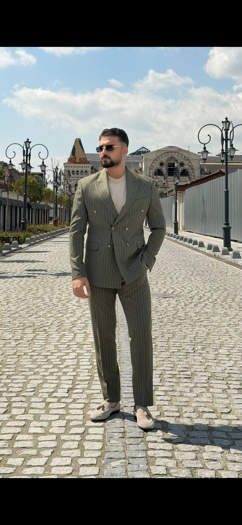Khaki pinstripe double breasted slim fit suit, front view