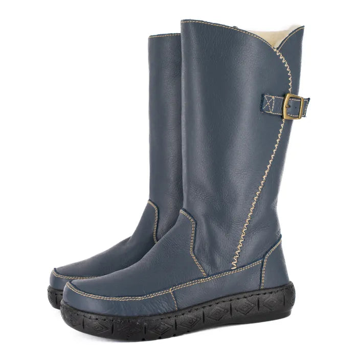 Pair of blue boots with a buckle on a white background